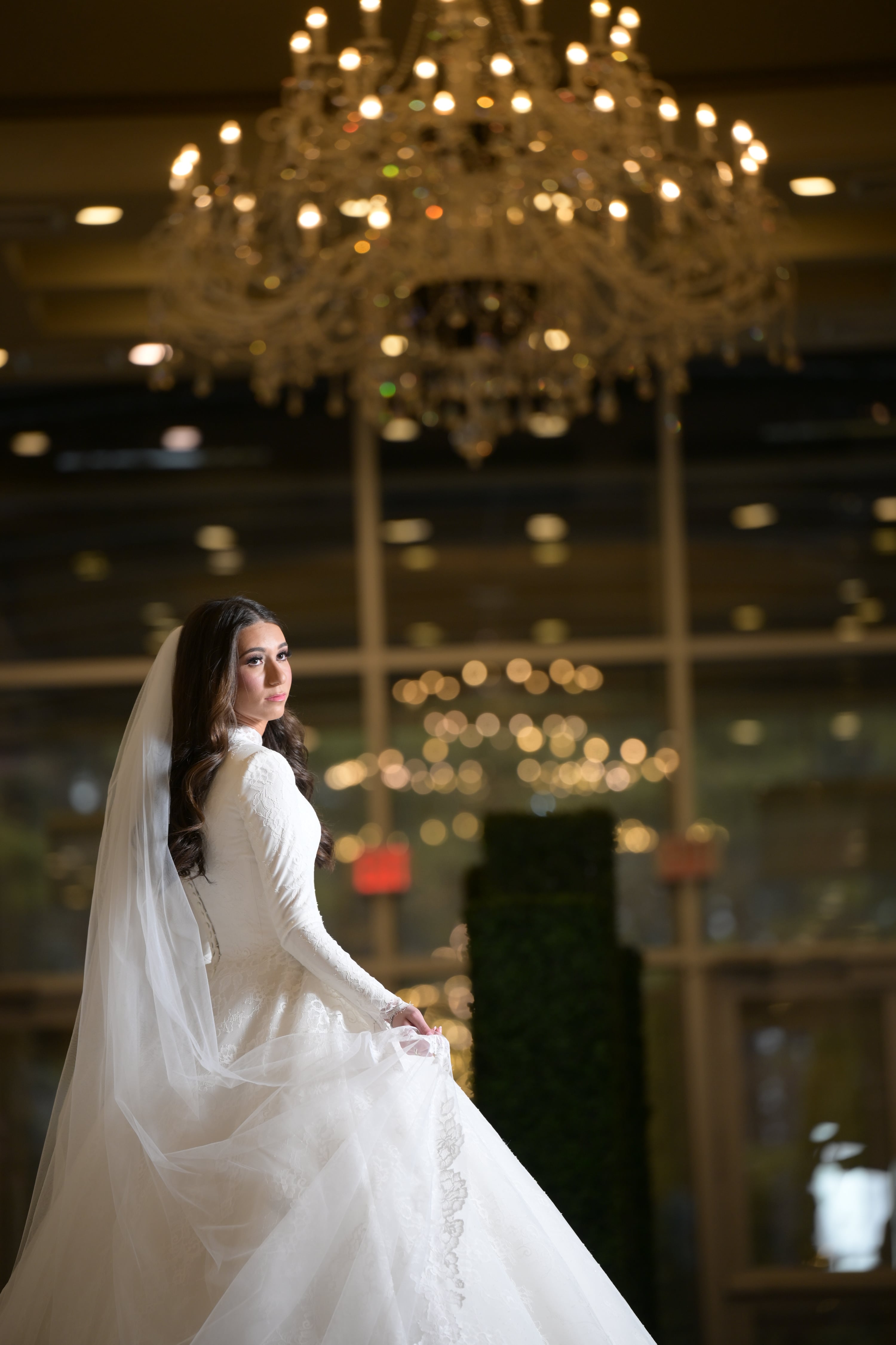 Bride twirling joyfully on polished floor