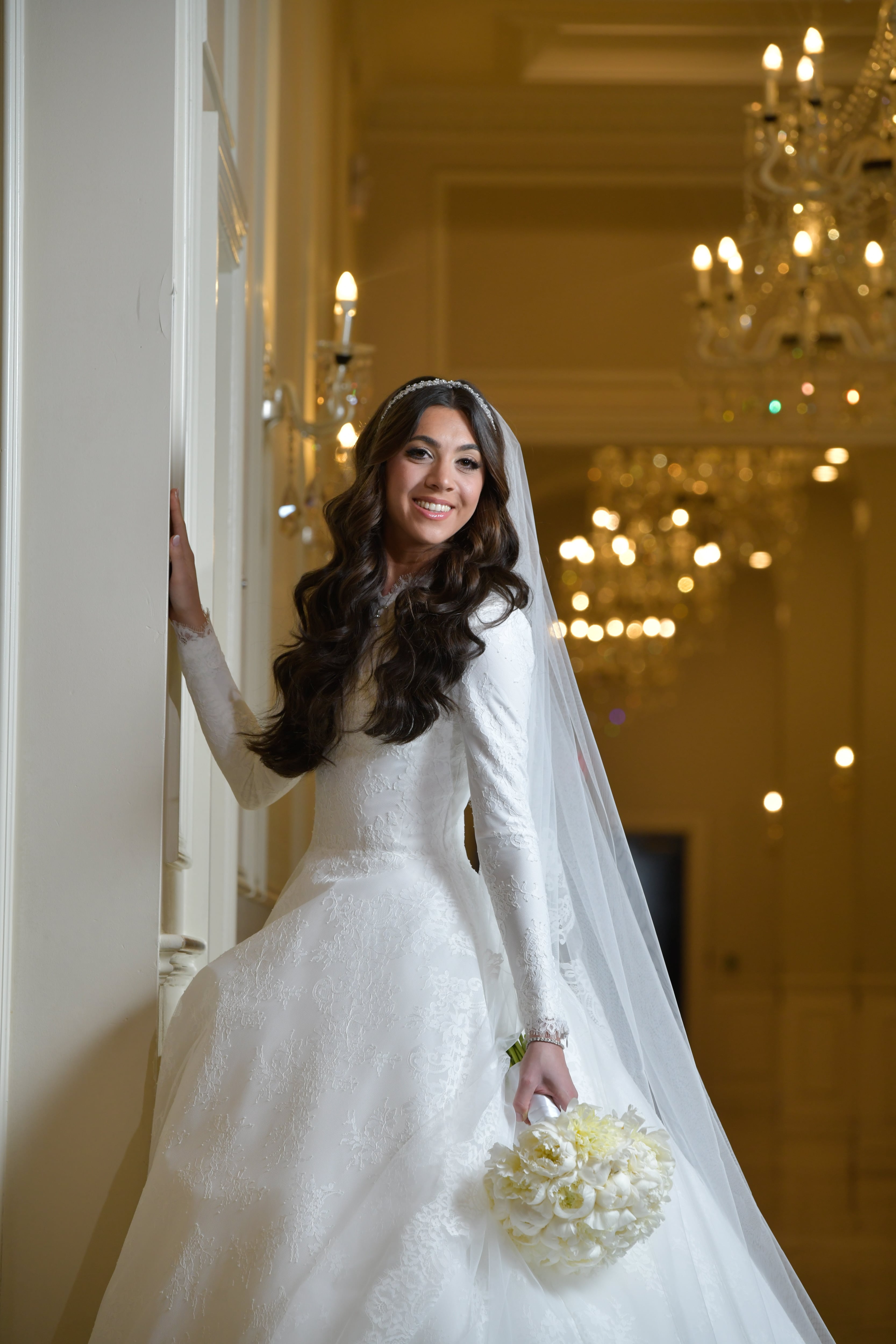 Bride at golden ballroom window light — Stein wedding